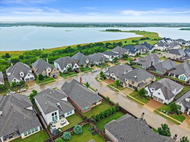 8325 Western, The Colony, TX 75056 - aerial perspective of suburban area featuring a large body of water