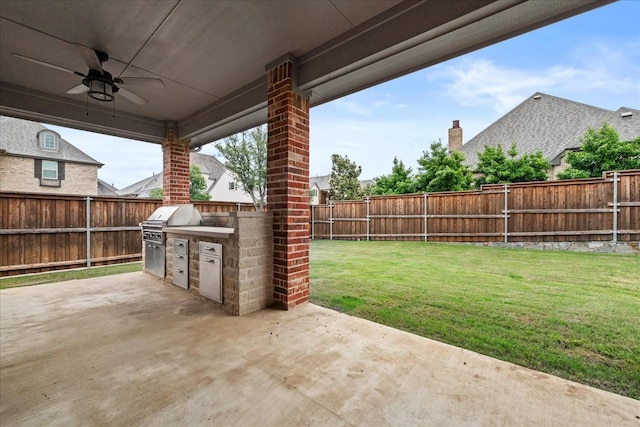 8325 Western, The Colony, TX 75056 - view of patio / terrace featuring area for grilling, ceiling fan, and exterior kitchen