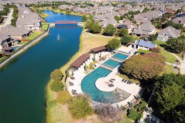 8325 Western, The Colony, TX 75056 - aerial perspective of suburban area with a large body of water and a pool area