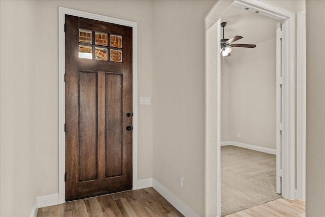 8325 Western, The Colony, TX 75056 - foyer featuring baseboards, a ceiling fan, and wood finished floors