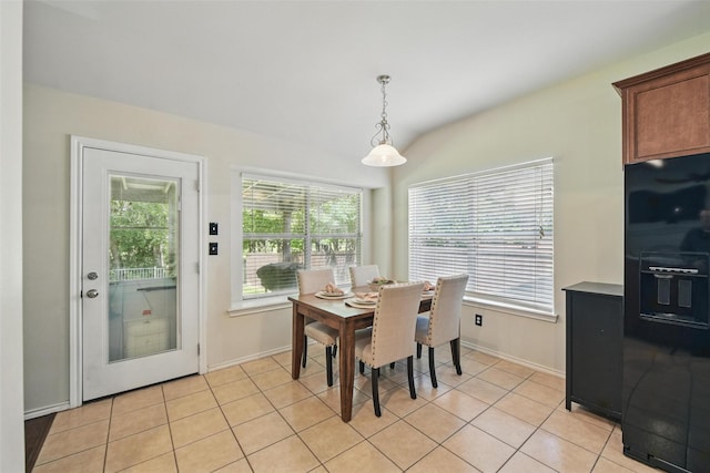 6008 Creekway Dr, Denton, TX 76226 - dining room featuring vaulted ceiling, baseboards, and light tile patterned floors