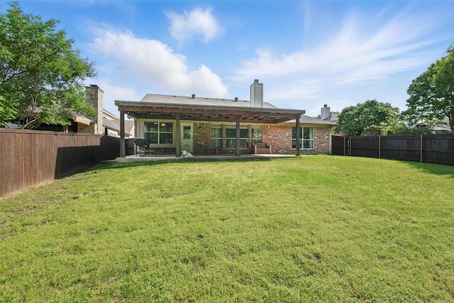 6008 Creekway Dr, Denton, TX 76226 - rear view of property with a patio, brick siding, and a chimney