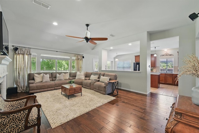 6008 Creekway Dr, Denton, TX 76226 - living room with ceiling fan, plenty of natural light, dark wood-style floors, and recessed lighting