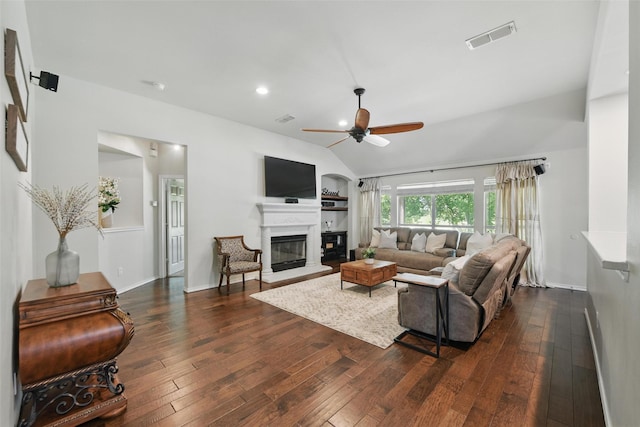 6008 Creekway Dr, Denton, TX 76226 - living area featuring a ceiling fan, vaulted ceiling, dark wood-type flooring, a glass covered fireplace, and recessed lighting