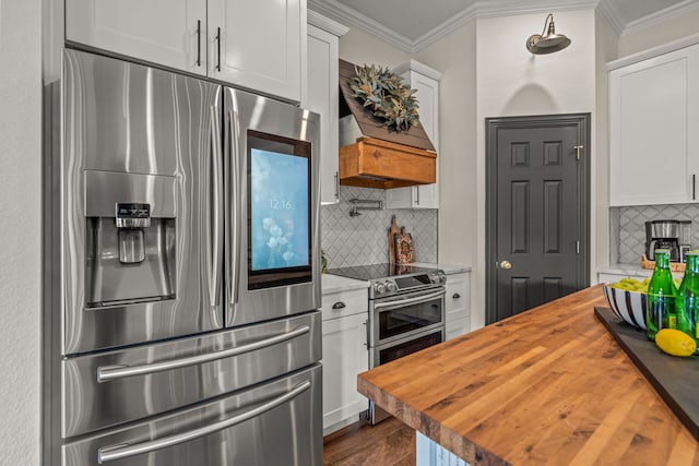 147 Rim Rock Rd, Aledo, TX 76008 - kitchen with appliances with stainless steel finishes, butcher block countertops, backsplash, crown molding, and white cabinets