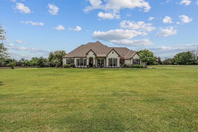 147 Rim Rock Rd, Aledo, TX 76008 - french country inspired facade featuring a front yard and stucco siding