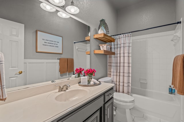 147 Rim Rock Rd, Aledo, TX 76008 - bathroom with toilet, vanity, shower / tub combo with curtain, and a textured wall