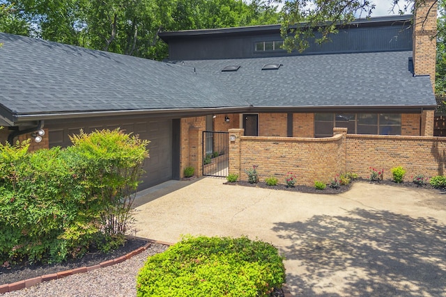 62 Legend Rd, Benbrook, TX 76132 - mid-century inspired home with a shingled roof, driveway, an attached garage, a gate, and brick siding