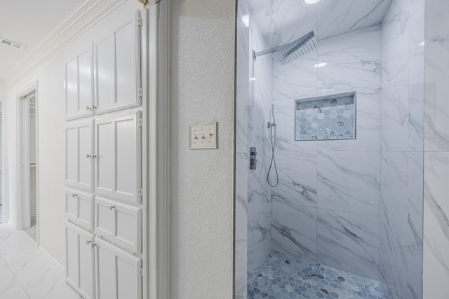 62 Legend Rd, Benbrook, TX 76132 - bathroom featuring a textured wall, a marble finish shower, crown molding, and marble look tiles