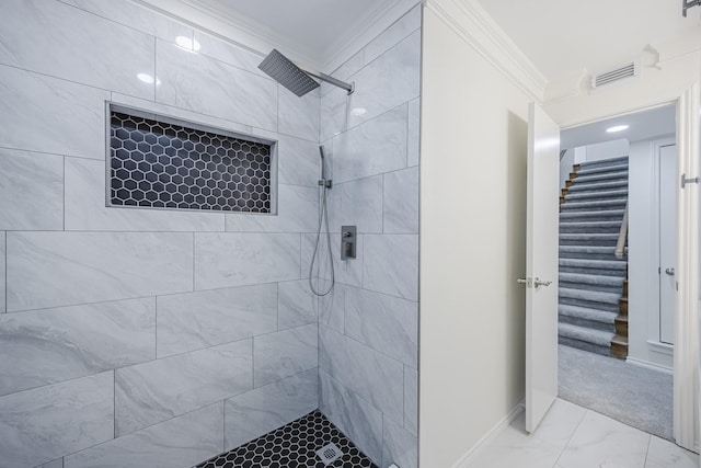 62 Legend Rd, Benbrook, TX 76132 - bathroom with ornamental molding, tiled shower, marble finish floors, and baseboards