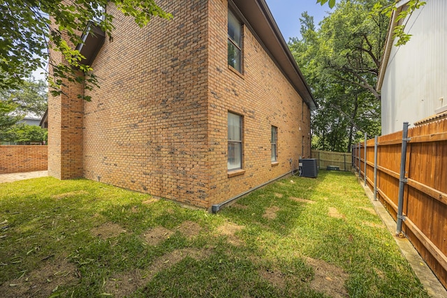 62 Legend Rd, Benbrook, TX 76132 - view of side of home with brick siding and central air condition unit