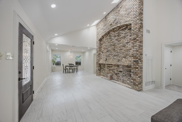 62 Legend Rd, Benbrook, TX 76132 - entryway featuring high vaulted ceiling, baseboards, and recessed lighting