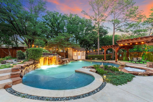1413 Hunters Ridge Cir, Denton, TX 76205 - view of pool featuring an in-ground hot tub, a fenced backyard, an outbuilding, a pergola, and a patio