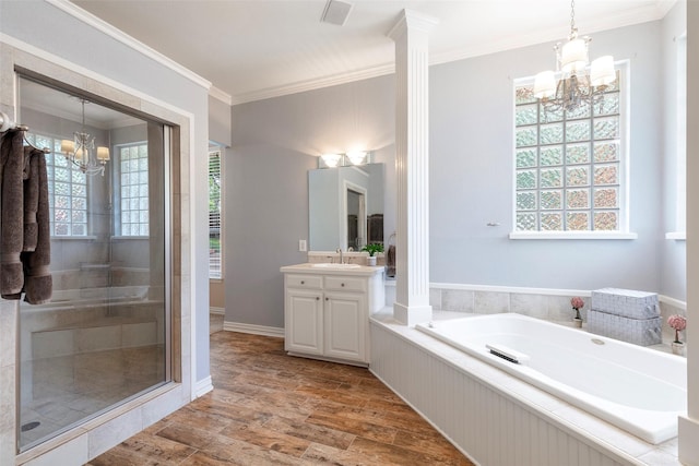 1413 Hunters Ridge Cir, Denton, TX 76205 - full bath featuring a chandelier, vanity, a stall shower, crown molding, and a bath