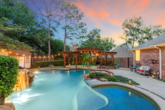 1413 Hunters Ridge Cir, Denton, TX 76205 - view of swimming pool featuring a pergola, fence, an outbuilding, and a patio area