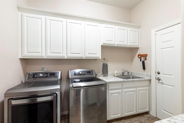 1413 Hunters Ridge Cir, Denton, TX 76205 - washroom featuring independent washer and dryer, cabinet space, and wood finished floors