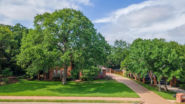 1413 Hunters Ridge Cir, Denton, TX 76205 - view of front of house featuring a front yard and brick siding