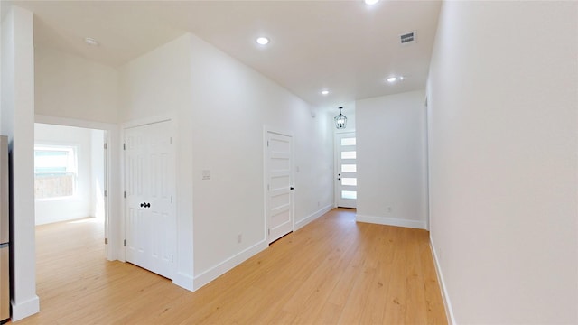 402 Perry Ave, Waxahachie, TX 75165 - empty room with light wood-style floors, recessed lighting, and baseboards