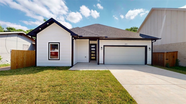 402 Perry Ave, Waxahachie, TX 75165 - view of front of house with an attached garage, driveway, and roof with shingles