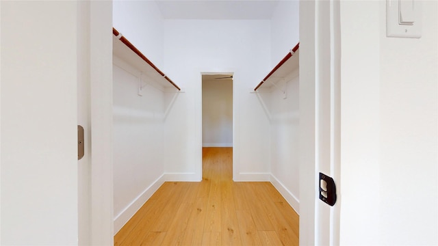 402 Perry Ave, Waxahachie, TX 75165 - spacious closet with light wood-type flooring