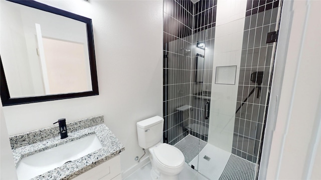 402 Perry Ave, Waxahachie, TX 75165 - full bathroom featuring a shower stall, toilet, and vanity
