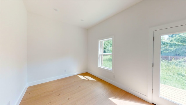 402 Perry Ave, Waxahachie, TX 75165 - spare room featuring light wood-type flooring and baseboards