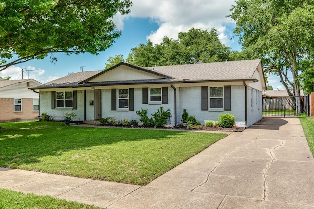 single story home featuring driveway and roof with shingles