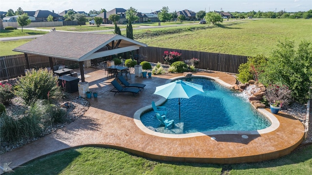 view of swimming pool featuring a patio area and a gazebo