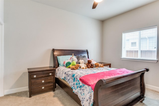 bedroom featuring carpet flooring, baseboards, and a ceiling fan