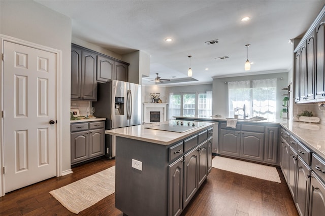 6308 Bittersweet Dr, Arlington, TX 76001 - kitchen featuring ceiling fan, stainless steel refrigerator with ice dispenser, black electric cooktop, gray cabinets, and recessed lighting