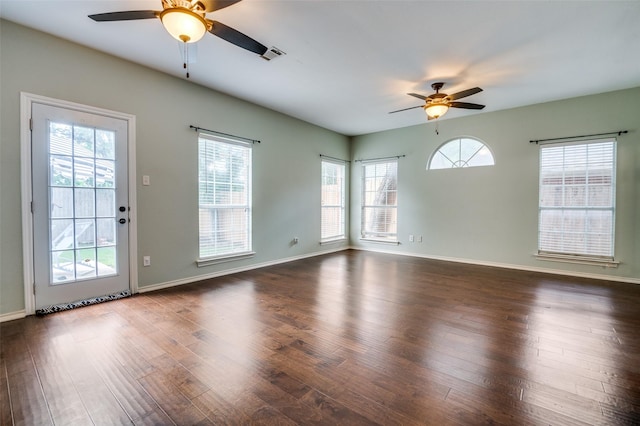 6308 Bittersweet Dr, Arlington, TX 76001 - empty room with ceiling fan, healthy amount of natural light, and wood finished floors