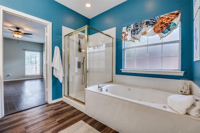 6308 Bittersweet Dr, Arlington, TX 76001 - bathroom featuring wood finished floors, a shower stall, a jetted tub, ceiling fan, and recessed lighting