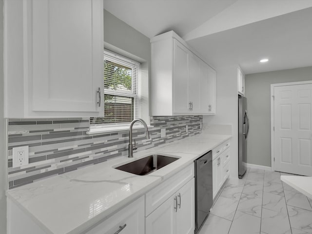 2834 Sunny Hill Ln, Farmers Branch, TX 75234 - kitchen featuring stainless steel appliances, a sink, white cabinetry, backsplash, and light stone counters
