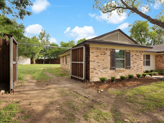 2834 Sunny Hill Ln, Farmers Branch, TX 75234 - view of property exterior with brick siding