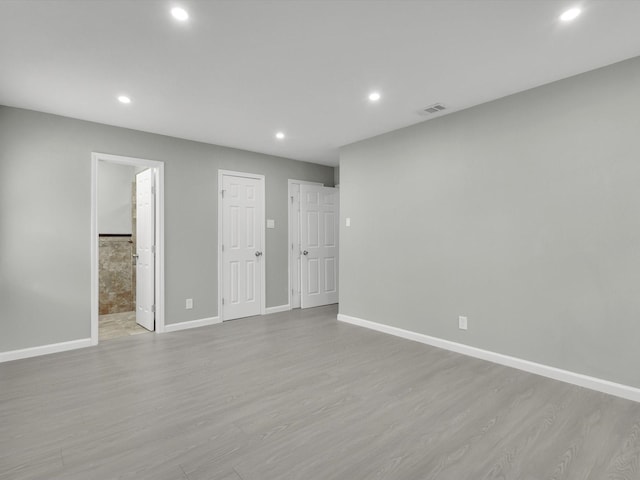2834 Sunny Hill Ln, Farmers Branch, TX 75234 - spare room featuring recessed lighting, light wood finished floors, and baseboards