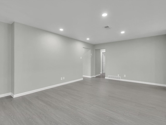 2834 Sunny Hill Ln, Farmers Branch, TX 75234 - empty room with wood finished floors, recessed lighting, and baseboards