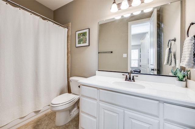 full bathroom with toilet, tile patterned flooring, and vanity