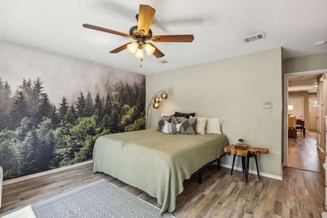 605 Preston Dr, Royse City, TX 75189 - bedroom featuring wood finished floors, baseboards, and a ceiling fan