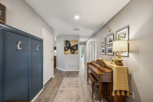 605 Preston Dr, Royse City, TX 75189 - hallway with wood finished floors, baseboards, and recessed lighting
