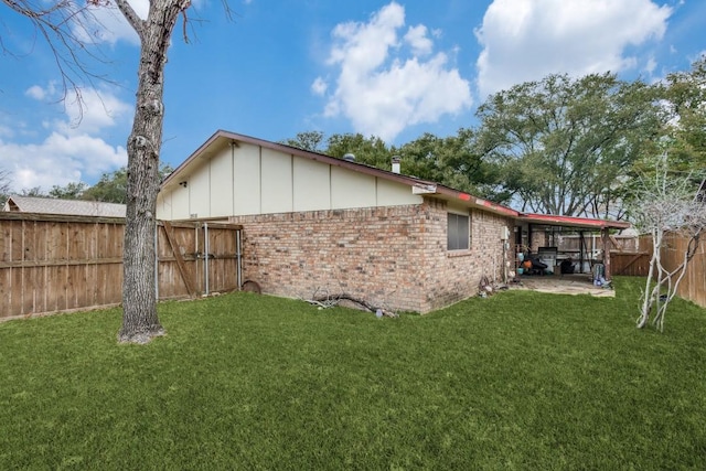 2818 Ashglen Dr, Garland, TX 75043 - view of home's exterior with brick siding and board and batten siding