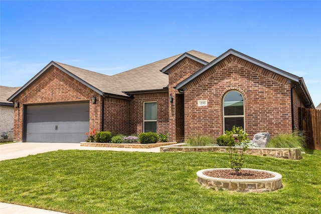 232 Cattlemans Trl, Saginaw, TX 76131 - view of front of home featuring a garage, brick siding, driveway, and roof with shingles