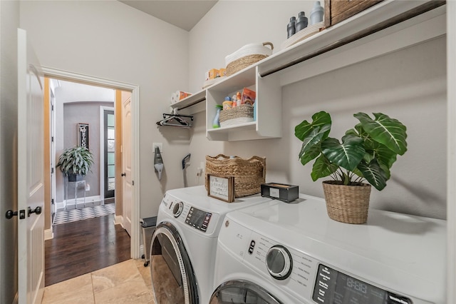 1212 Teton Dr, Burleson, TX 76028 - clothes washing area featuring washing machine and clothes dryer and baseboards