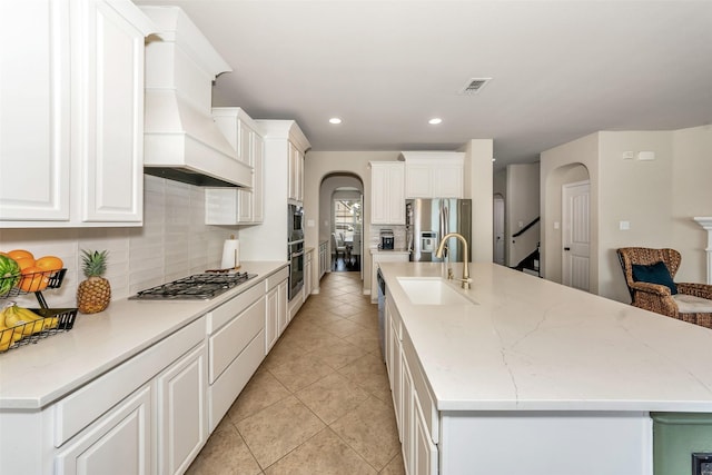 8625 Tribute Ln, Fort Worth, TX 76131 - kitchen featuring appliances with stainless steel finishes, a sink, custom exhaust hood, backsplash, and recessed lighting