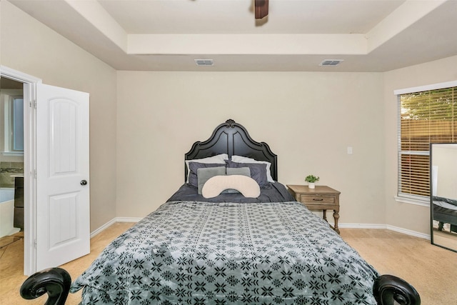 8625 Tribute Ln, Fort Worth, TX 76131 - bedroom featuring light colored carpet, a tray ceiling, and baseboards