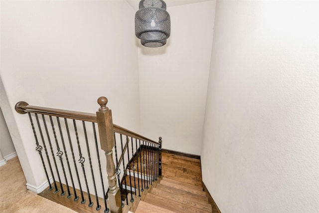 8625 Tribute Ln, Fort Worth, TX 76131 - stairway with baseboards and wood finished floors