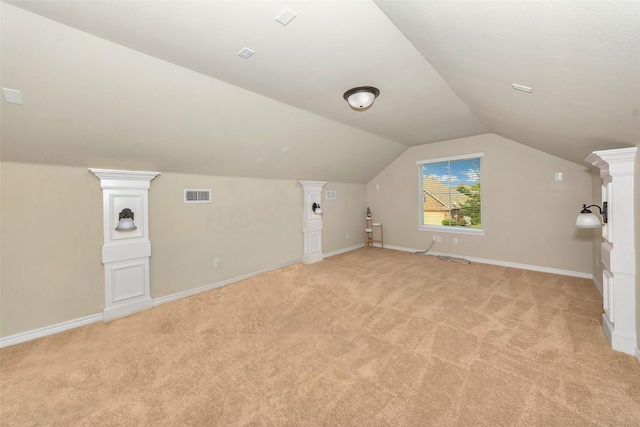 8625 Tribute Ln, Fort Worth, TX 76131 - additional living space with light carpet, vaulted ceiling, and baseboards