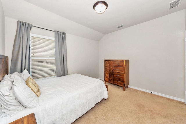 8625 Tribute Ln, Fort Worth, TX 76131 - bedroom featuring light colored carpet, lofted ceiling, and baseboards