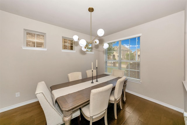 8625 Tribute Ln, Fort Worth, TX 76131 - dining space with baseboards, a chandelier, and dark wood-type flooring