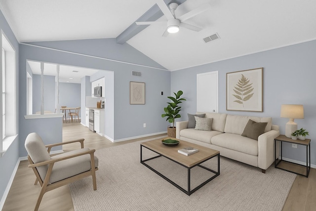 2017 Moline Dr, Haltom City, TX 76117 - living area featuring light wood-style flooring, ceiling fan, and baseboards
