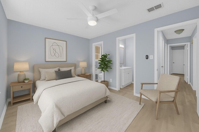 2017 Moline Dr, Haltom City, TX 76117 - bedroom featuring light wood-style flooring, baseboards, and connected bathroom